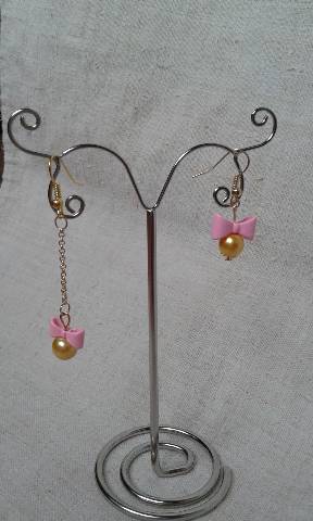 boucles d'oreilles noeud rose