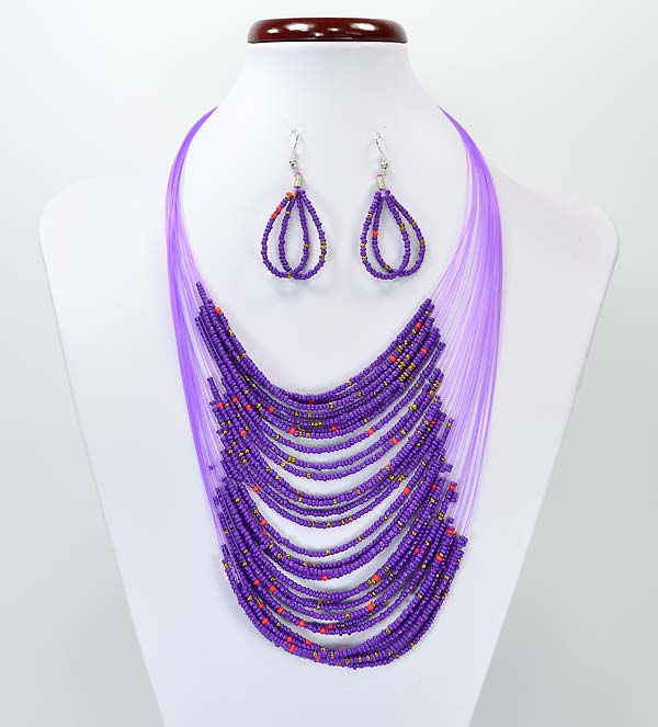 parure multirangs de perles violettes